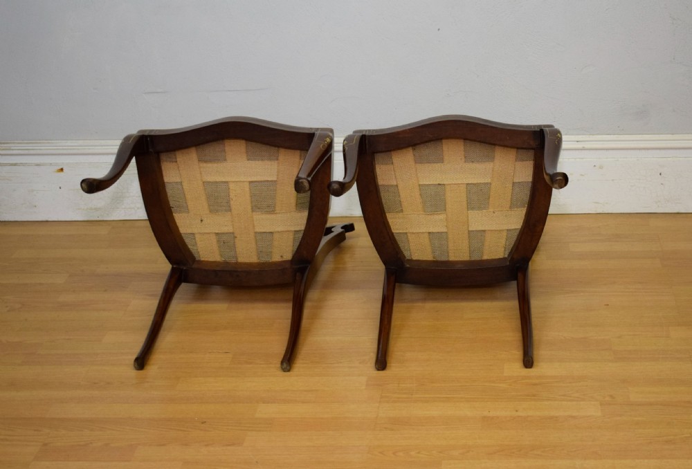 A pair of Victorian side chairs featuring dark mahogany frames with detailed marquetry inlays, fan-shaped pierced backrests, and cream upholstered seats. View XXIII