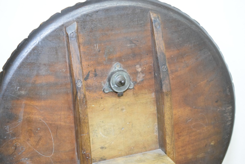 A dark mahogany Georgian tripod table featuring a circular top with a moulded rim, a turned central stem, and three splayed cabriole legs. View XIV