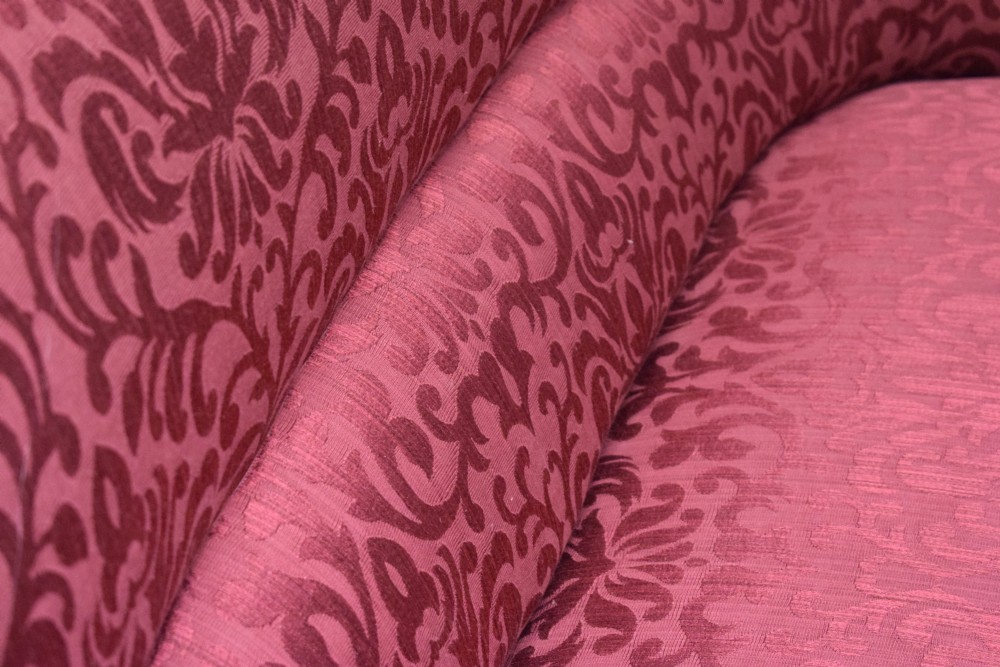 An antique French canape settee with a carved gold-gilded frame, cabriole legs, and red patterned damask upholstery. View XXX