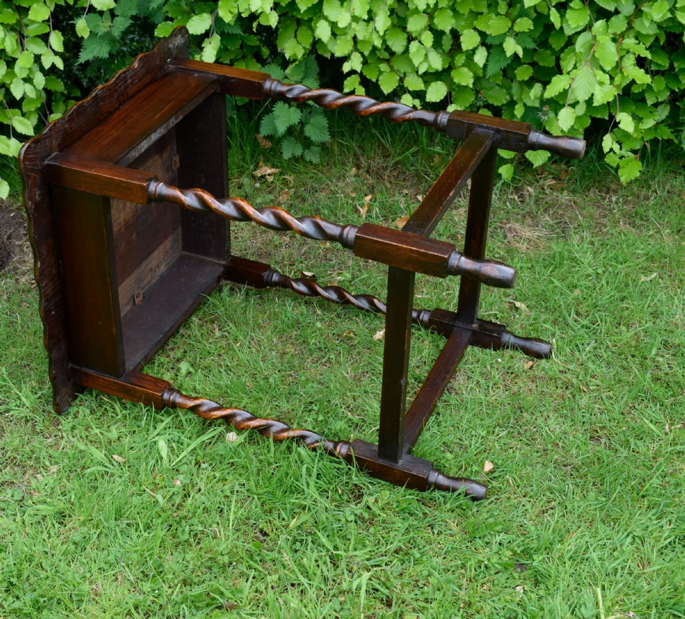 A dark brown square oak side table featuring a scalloped piecrust edge, four barley twist turned legs, and a lower square stretcher frame. View XI