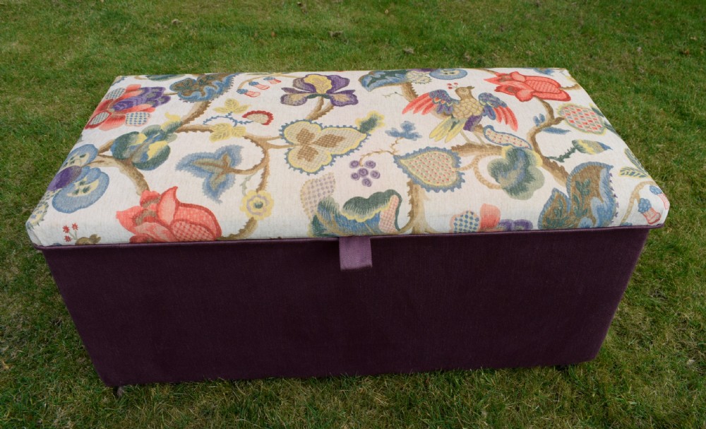 A rectangular Victorian upholstered storage ottoman featuring a deep purple base and a floral patterned fabric lid. View XIV