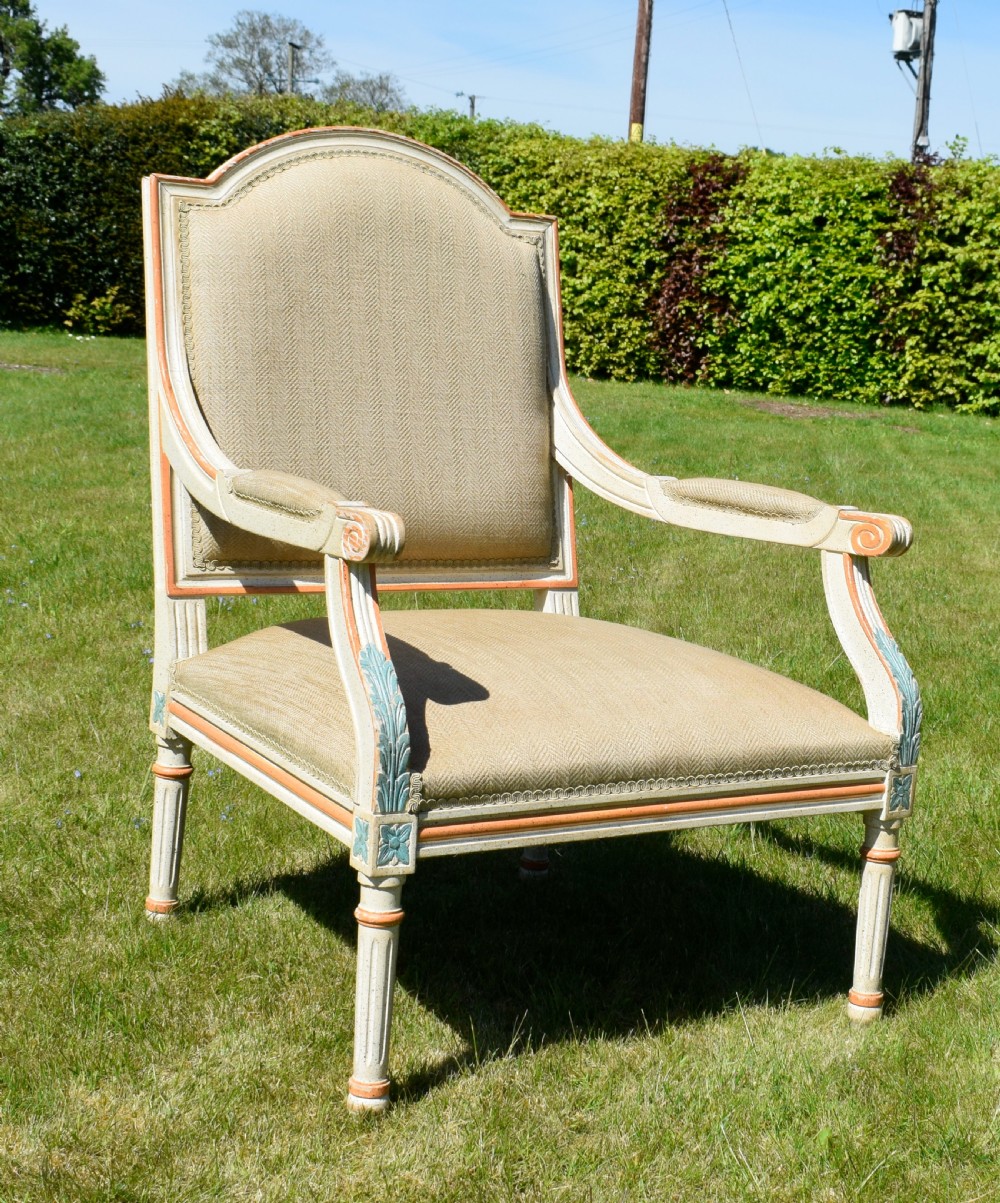 An early 20th-century French Louis XVI style fauteuil armchair featuring a painted off-white frame with fluted legs and beige herringbone fabric upholstery. View II