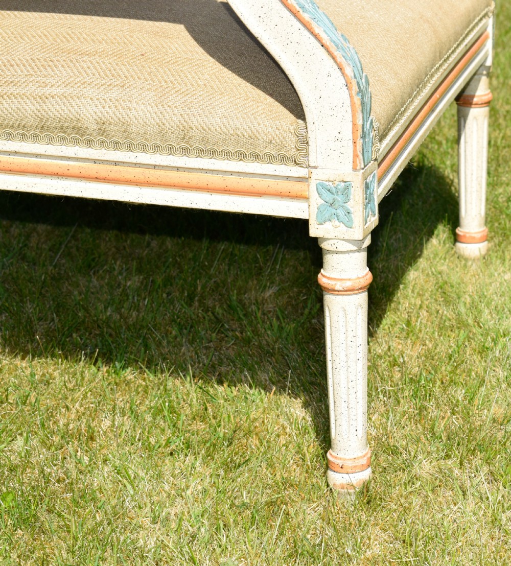 An early 20th-century French Louis XVI style fauteuil armchair featuring a painted off-white frame with fluted legs and beige herringbone fabric upholstery. View VI