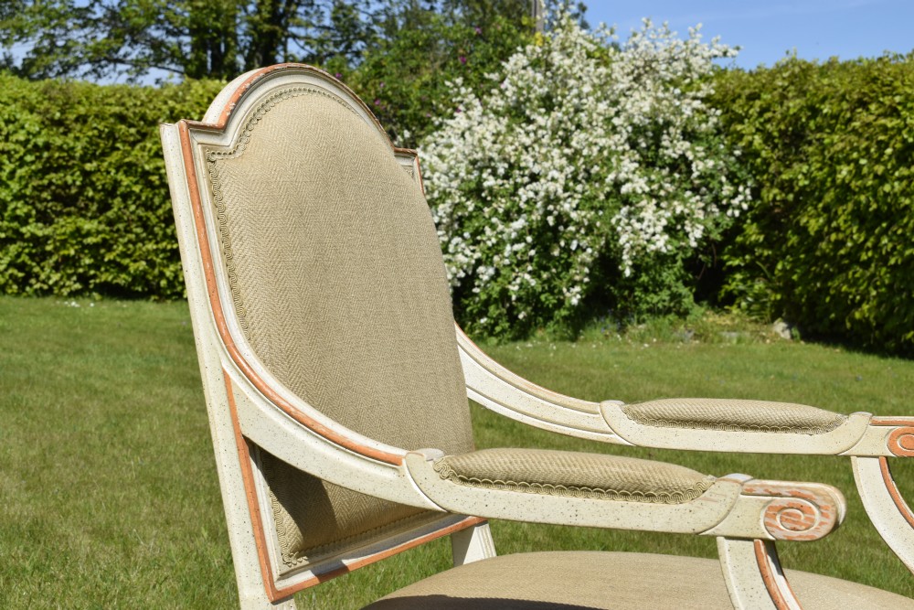 An early 20th-century French Louis XVI style fauteuil armchair featuring a painted off-white frame with fluted legs and beige herringbone fabric upholstery. View IX