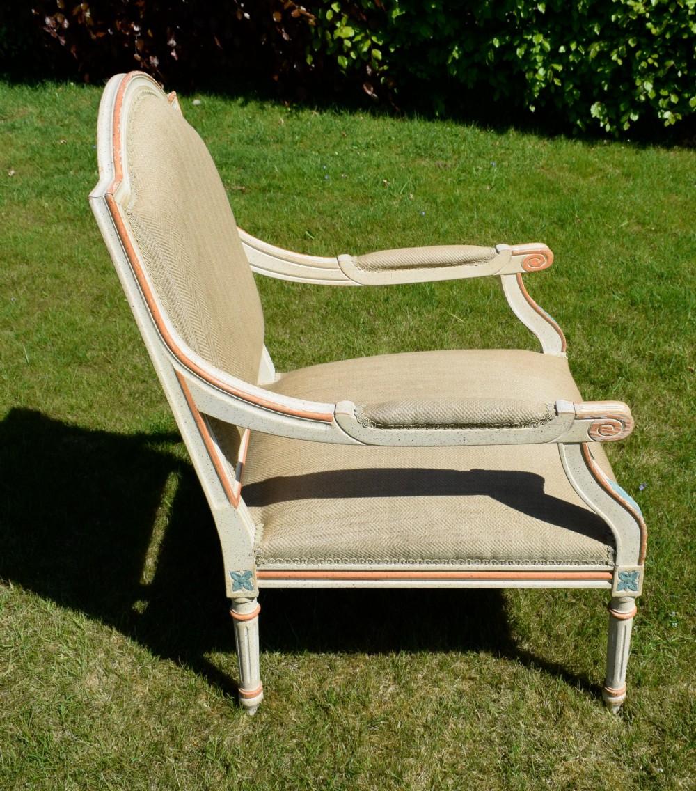 An early 20th-century French Louis XVI style fauteuil armchair featuring a painted off-white frame with fluted legs and beige herringbone fabric upholstery. View XIII