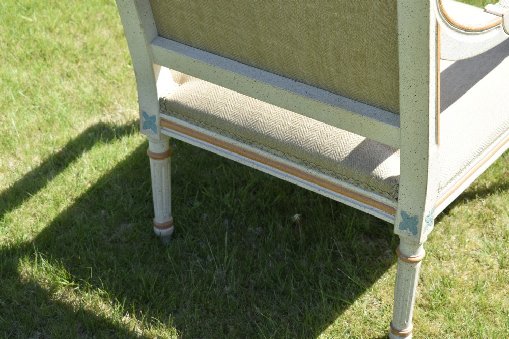 An early 20th-century French Louis XVI style fauteuil armchair featuring a painted off-white frame with fluted legs and beige herringbone fabric upholstery. View XV