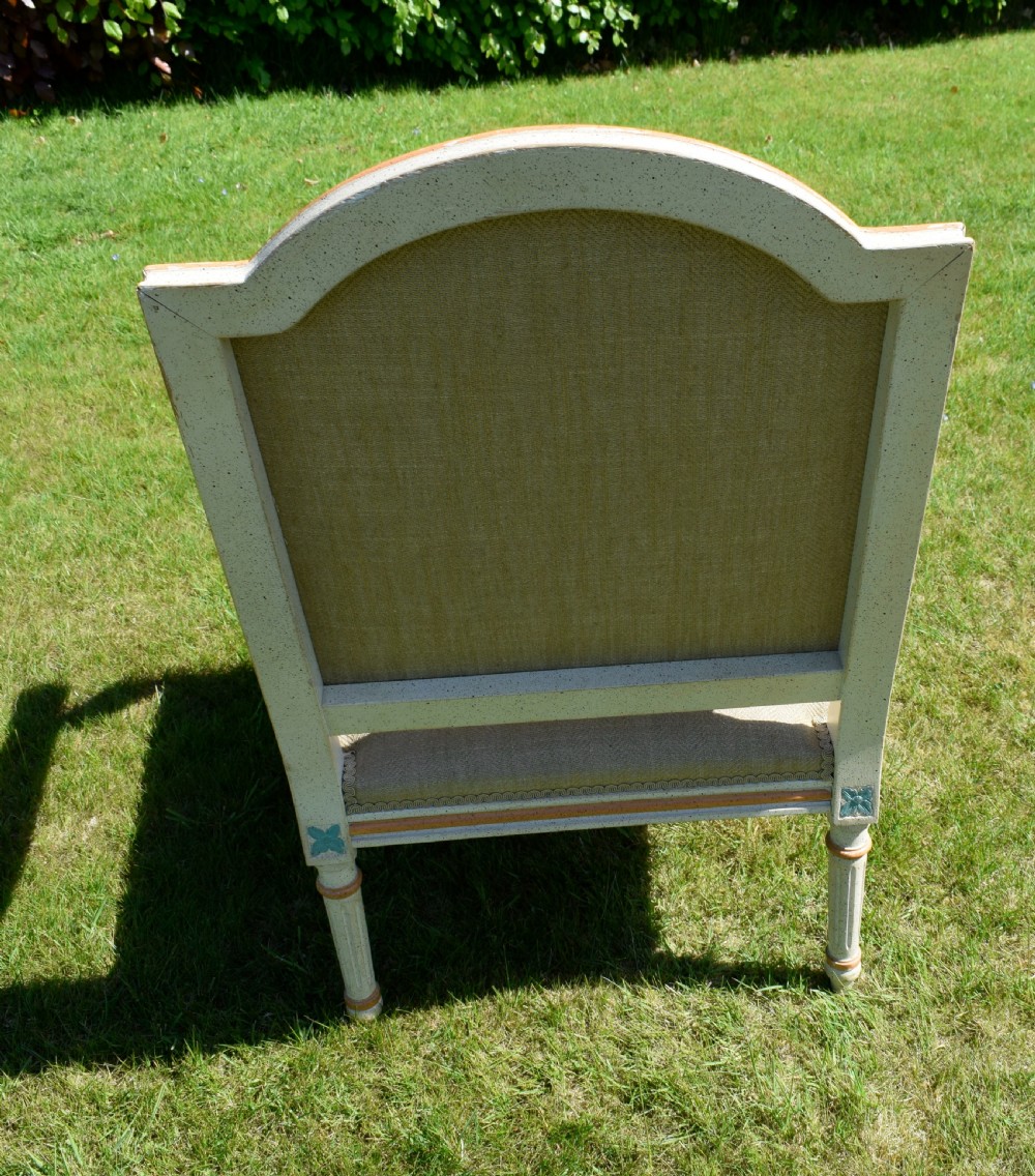 An early 20th-century French Louis XVI style fauteuil armchair featuring a painted off-white frame with fluted legs and beige herringbone fabric upholstery. View XXII