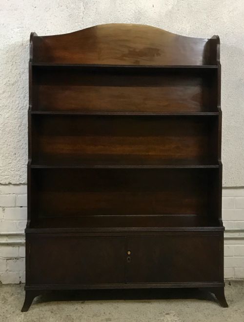 GEORGIAN MAHOGANY WATERFALL BOOKCASE WITH CUPBOARD TO BASE - ADDITIONAL PHOTO 1
