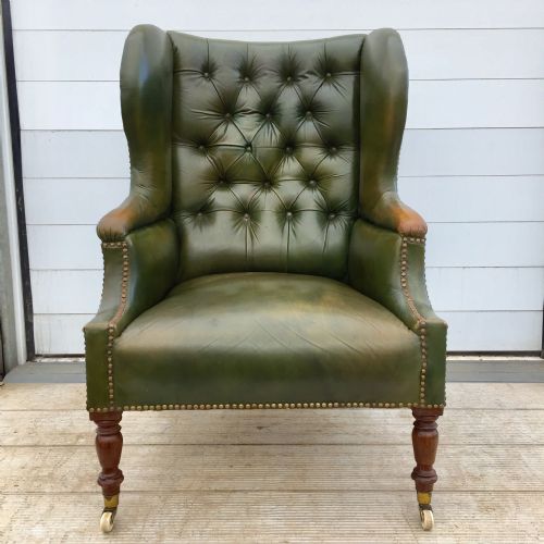 circa 1900 leather button back wing arm chair - CATEGORY: ANTIQUE CHAIRS - DATED 1900