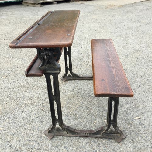 circa 1900 double seat school desk with elm top and seat on cast iron base - CATEGORY: ANTIQUE DESKS - DATED 1900