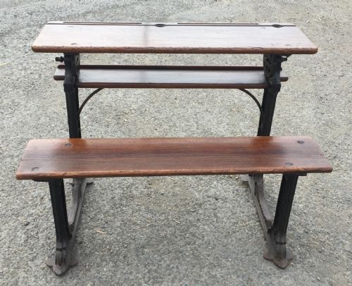 CIRCA 1900 DOUBLE SEAT SCHOOL DESK WITH ELM TOP AND SEAT ON CAST IRON BASE - ADDITIONAL PHOTO 2