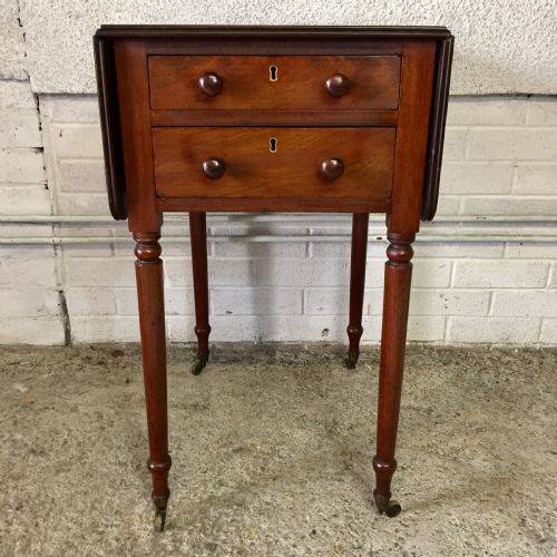 early victorian mahogany work table with drop flaps and complete with original knobs and on original brass castors - CATEGORY: ANTIQUE TABLES - DATED VICTORIAN