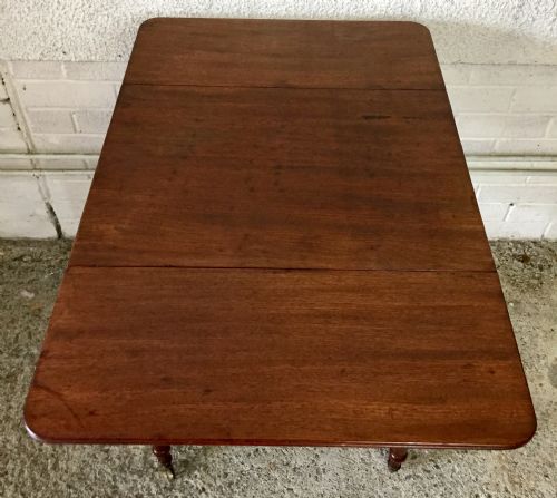 EARLY VICTORIAN MAHOGANY WORK TABLE WITH DROP FLAPS AND COMPLETE WITH ORIGINAL KNOBS AND ON ORIGINAL BRASS CASTORS - ADDITIONAL PHOTO 12