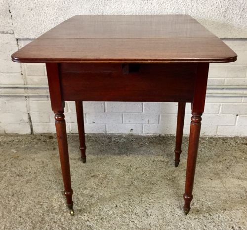 EARLY VICTORIAN MAHOGANY WORK TABLE WITH DROP FLAPS AND COMPLETE WITH ORIGINAL KNOBS AND ON ORIGINAL BRASS CASTORS - ADDITIONAL PHOTO 15