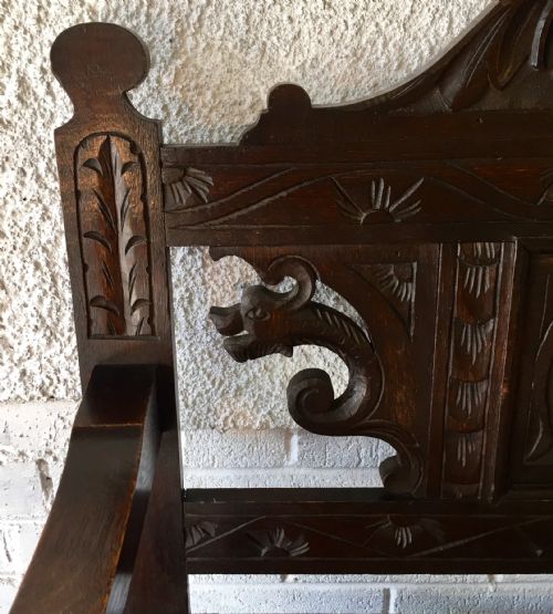 CIRCA 1900 CARVED OAK HALL BENCH WITH LIFT UP SEAT - ADDITIONAL PHOTO 3