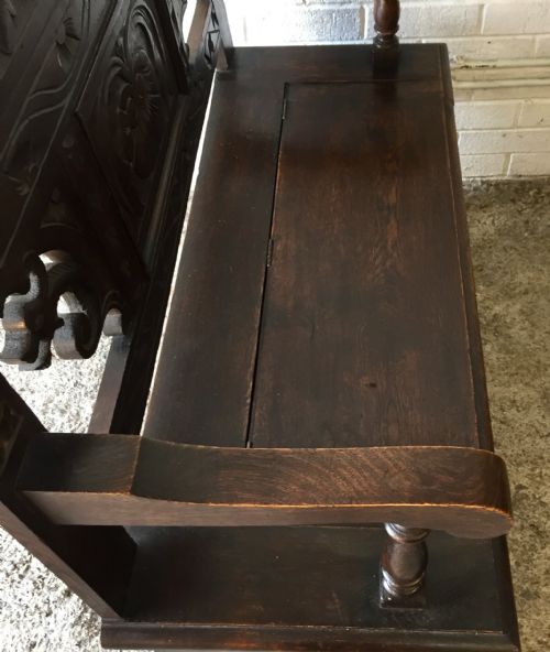 CIRCA 1900 CARVED OAK HALL BENCH WITH LIFT UP SEAT - ADDITIONAL PHOTO 5