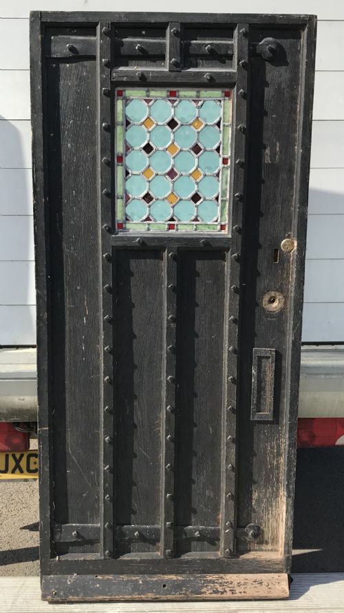 CIRCA 1900 OAK DOOR COMPLETE WITH ORIGINAL FRAME AND WITH IRON HINGES AND LEAD LIGHT PANEL - ADDITIONAL PHOTO 1