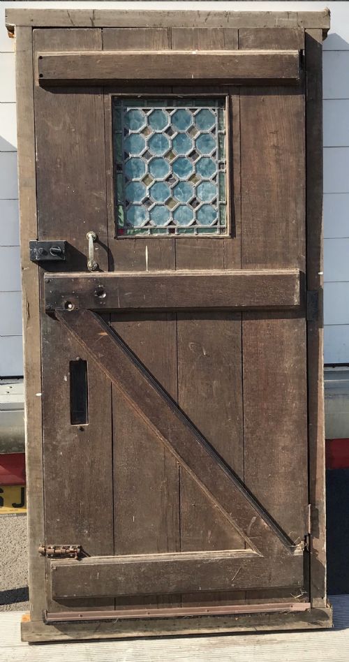 CIRCA 1900 OAK DOOR COMPLETE WITH ORIGINAL FRAME AND WITH IRON HINGES AND LEAD LIGHT PANEL - ADDITIONAL PHOTO 9
