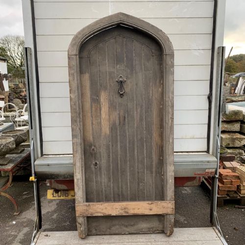 19th century arched oak door with frame - CATEGORY: ANTIQUE MISCELLANEOUS - DATED 19TH CENTURY