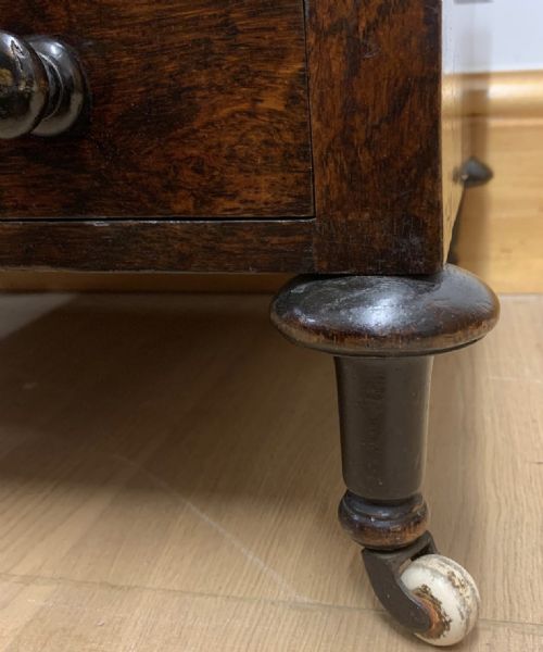 EARLY VICTORIAN ROSEWOOD CANTERBURY WITH EBONISED KNOBS AND STANDING ON BRASS CASTORS - ADDITIONAL PHOTO 5