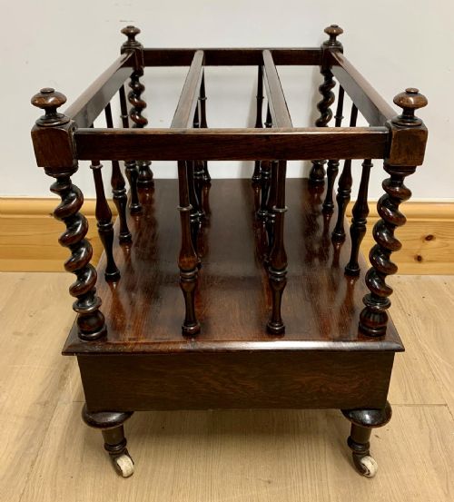 EARLY VICTORIAN ROSEWOOD CANTERBURY WITH EBONISED KNOBS AND STANDING ON BRASS CASTORS - ADDITIONAL PHOTO 7