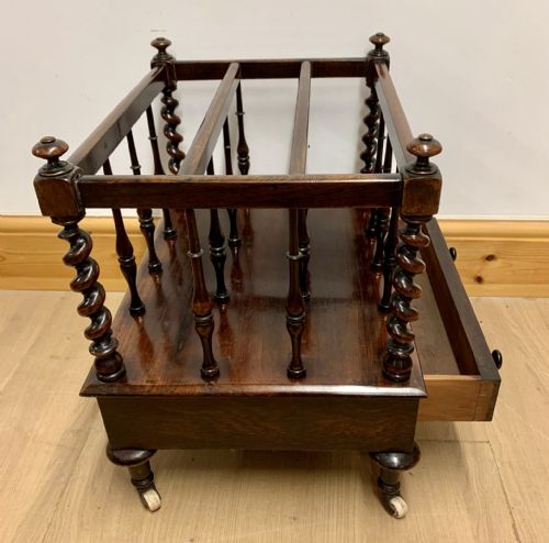 EARLY VICTORIAN ROSEWOOD CANTERBURY WITH EBONISED KNOBS AND STANDING ON BRASS CASTORS - ADDITIONAL PHOTO 8