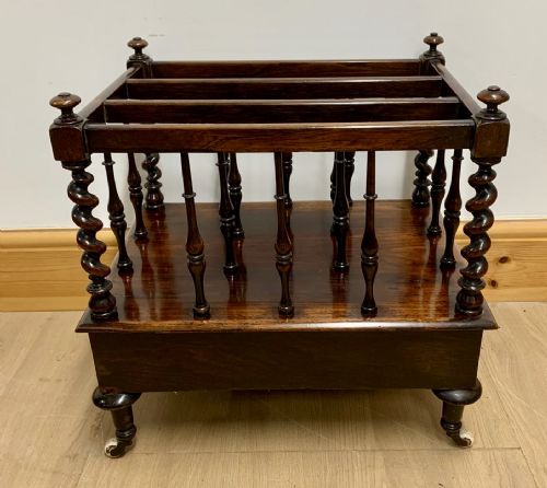 EARLY VICTORIAN ROSEWOOD CANTERBURY WITH EBONISED KNOBS AND STANDING ON BRASS CASTORS - ADDITIONAL PHOTO 9