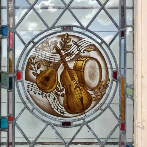 VICTORIAN ARCH TOP EXTERNAL PINE DOOR WITH STAINED GLASS PANELS DEPICTING MUSICAL INSTRUMENTS AND ORIGINAL FRAME - ADDITIONAL PHOTO 6
