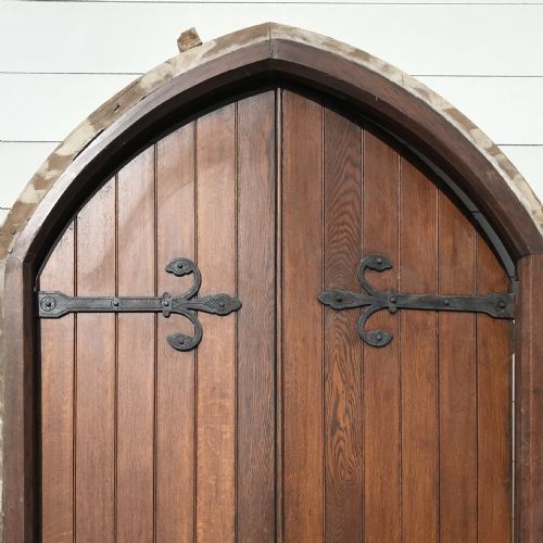 PAIR OF 19TH CENTURY ARCH TOP OAK DOORS WITH DECORATIVE HINGES AND HANDLES AND FRAME - ADDITIONAL PHOTO 2