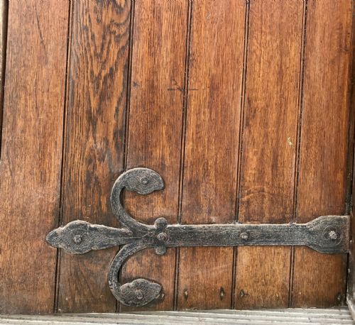 PAIR OF 19TH CENTURY ARCH TOP OAK DOORS WITH DECORATIVE HINGES AND HANDLES AND FRAME - ADDITIONAL PHOTO 8