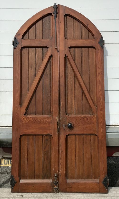 PAIR OF 19TH CENTURY ARCH TOP OAK DOORS WITH DECORATIVE HINGES AND HANDLES AND FRAME - ADDITIONAL PHOTO 9