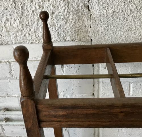 EDWARDIAN OAK DOUBLE STICK STAND WITH CENTRAL BRASS RAIL AND TURNED FINIALS - ADDITIONAL PHOTO 2