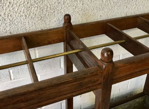 EDWARDIAN OAK DOUBLE STICK STAND WITH CENTRAL BRASS RAIL AND TURNED FINIALS - ADDITIONAL PHOTO 3