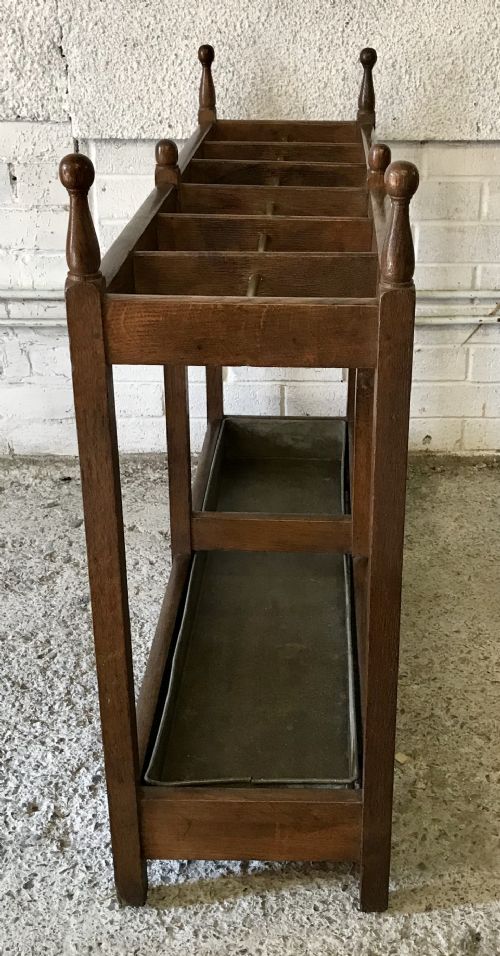 EDWARDIAN OAK DOUBLE STICK STAND WITH CENTRAL BRASS RAIL AND TURNED FINIALS - ADDITIONAL PHOTO 8