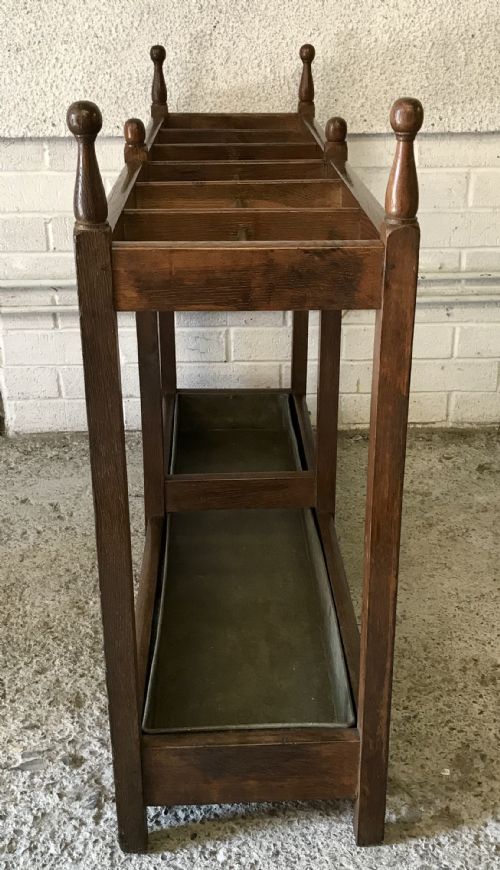 EDWARDIAN OAK DOUBLE STICK STAND WITH CENTRAL BRASS RAIL AND TURNED FINIALS - ADDITIONAL PHOTO 10
