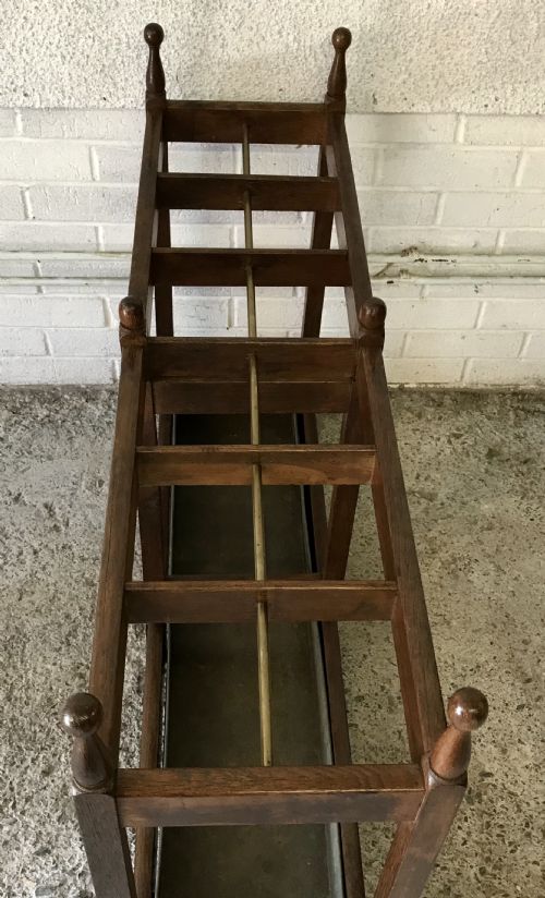 EDWARDIAN OAK DOUBLE STICK STAND WITH CENTRAL BRASS RAIL AND TURNED FINIALS - ADDITIONAL PHOTO 11