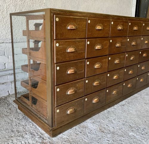 early 20th century brass framed haberdashery cabinet with 30 oak graduated drawers - CATEGORY: ANTIQUE CABINETS - DATED 1920