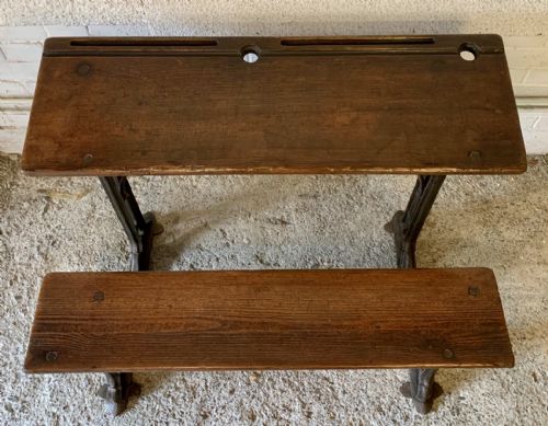 CIRCA 1900 DOUBLE SEAT SCHOOL DESK WITH ELM TOP AND SEAT ON CAST IRON BASE - ADDITIONAL PHOTO 4