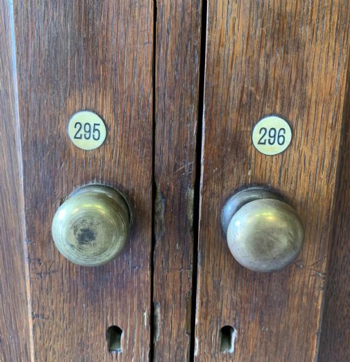 EARLY 20TH CENTURY OAK BOOKCASE COMPLETE WITH ORIGINAL BRASS HANDLES AND NUMBER PLATES - ADDITIONAL PHOTO 12