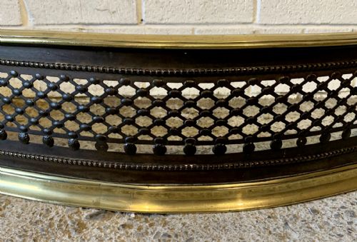 19TH CENTURY BRASS AND IRON SERPENTINE FENDER - ADDITIONAL PHOTO 6