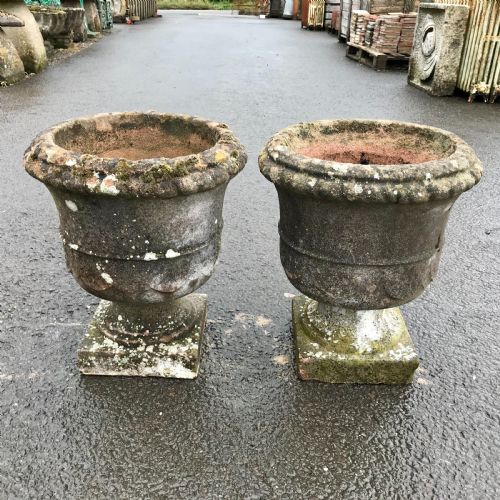 PAIR OF EARLY 20TH CENTURY RECONSTITUTED STONE URNS - ADDITIONAL PHOTO 1