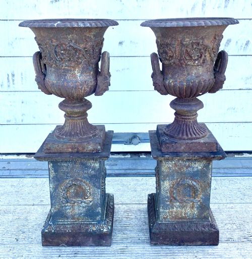 CIRCA 1900 PAIR OF CAST IRON URNS ON ORIGINAL PLINTHS - ADDITIONAL PHOTO 1