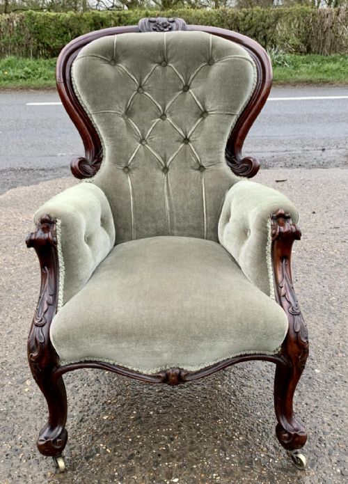VICTORIAN WALNUT SHOW FRAME ARMCHAIR WITH BUTTON BACK UPHOLSTERY AND LEAF CAPPED CABRIOLE FRONT LEGS - ADDITIONAL PHOTO 1