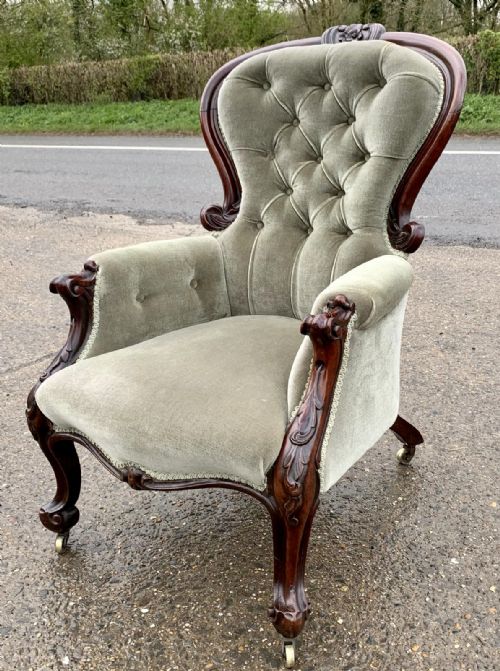 VICTORIAN WALNUT SHOW FRAME ARMCHAIR WITH BUTTON BACK UPHOLSTERY AND LEAF CAPPED CABRIOLE FRONT LEGS - ADDITIONAL PHOTO 2