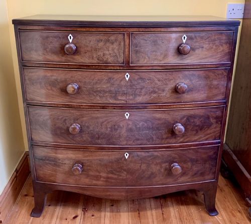early victorian mahogany bow front chest of drawers with original turned knobs and ivory inset escutcheons - CATEGORY: ANTIQUE CHEST OF DRAWERS - DATED 1850
