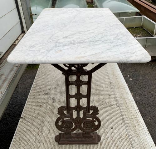 VICTORIAN CAST IRON TABLE WITH MARBLE TOP SOLD - ADDITIONAL PHOTO 2
