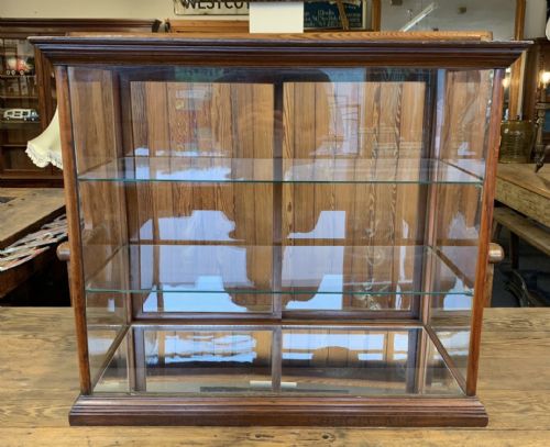 circa 1900 mahogany glass shop display cabinet with cadbury's chocolate inscribed to base - CATEGORY: ANTIQUE CABINETS - DATED 1900
