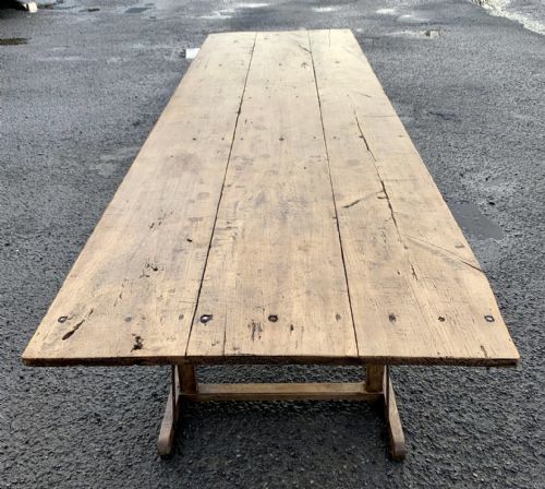 19TH CENTURY FRENCH TRESTLE TABLE WITH 3 PLANK FRUITWOOD TOP AND OAK TRESTLES - ADDITIONAL PHOTO 3