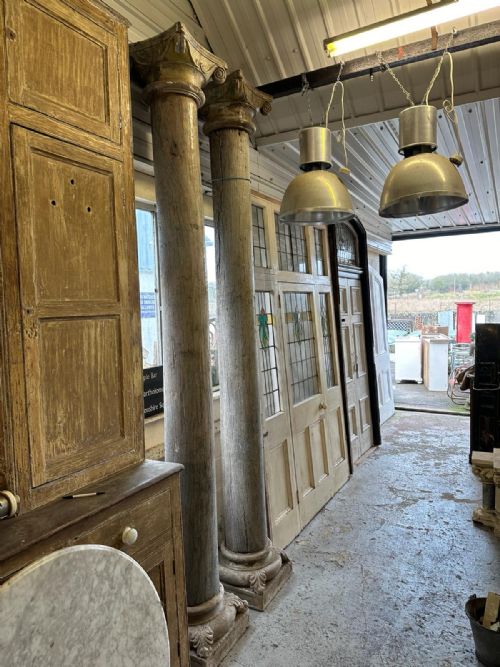 PAIR OF COLUMNS CIRCA 1900 HARDWOOD CARVED IONIC CAPITAL CARVED STONE BASES