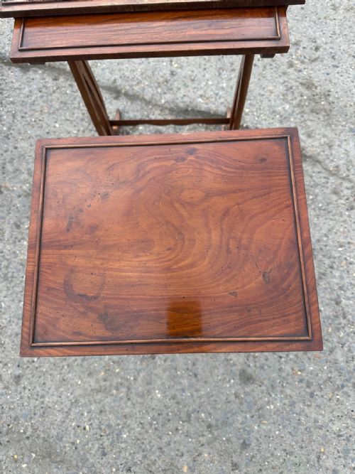A NEST OF THREE VICTORIAN WALNUT TABLES - ADDITIONAL PHOTO 1